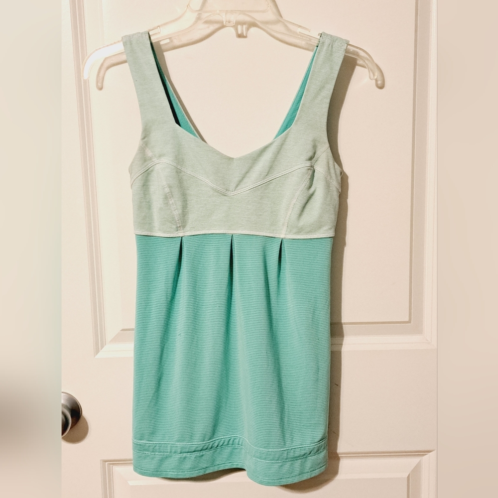 Lululemon run. Tame me tank. Mint green stripe.  Women’s Size 4.